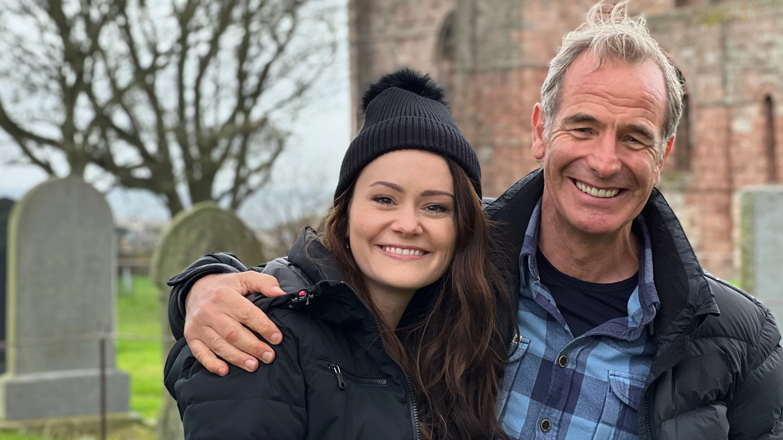 LJ Ross with Robson Green on Holy Island