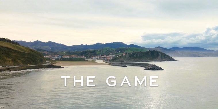 Coastal view with The Game written over