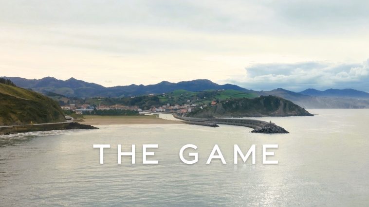Coastal view with The Game written over
