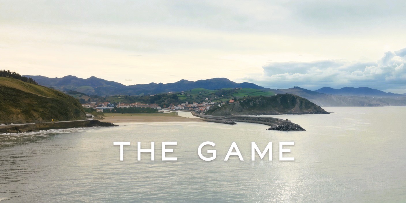 Coastal view with The Game written over