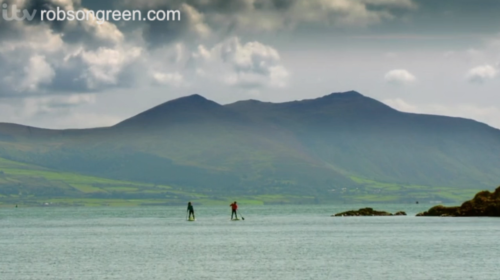 For the Love of Britain S1 E6 - Robson Green is paddle-boarding on the Isle of Anglesey