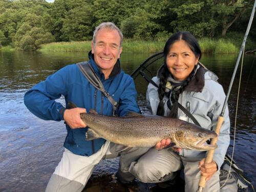 Robson Green with partner Zoila and 11lb trout
